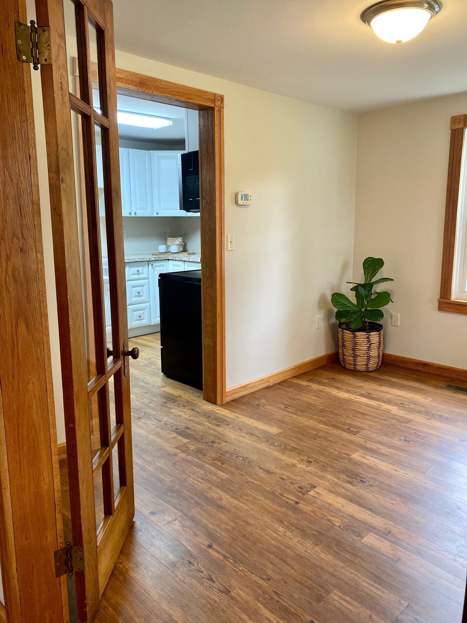 7524 Briery Branch Road Dayton, VA 22821 - Photo 15 of 28 a view of a hallway with wooden floor and staircase