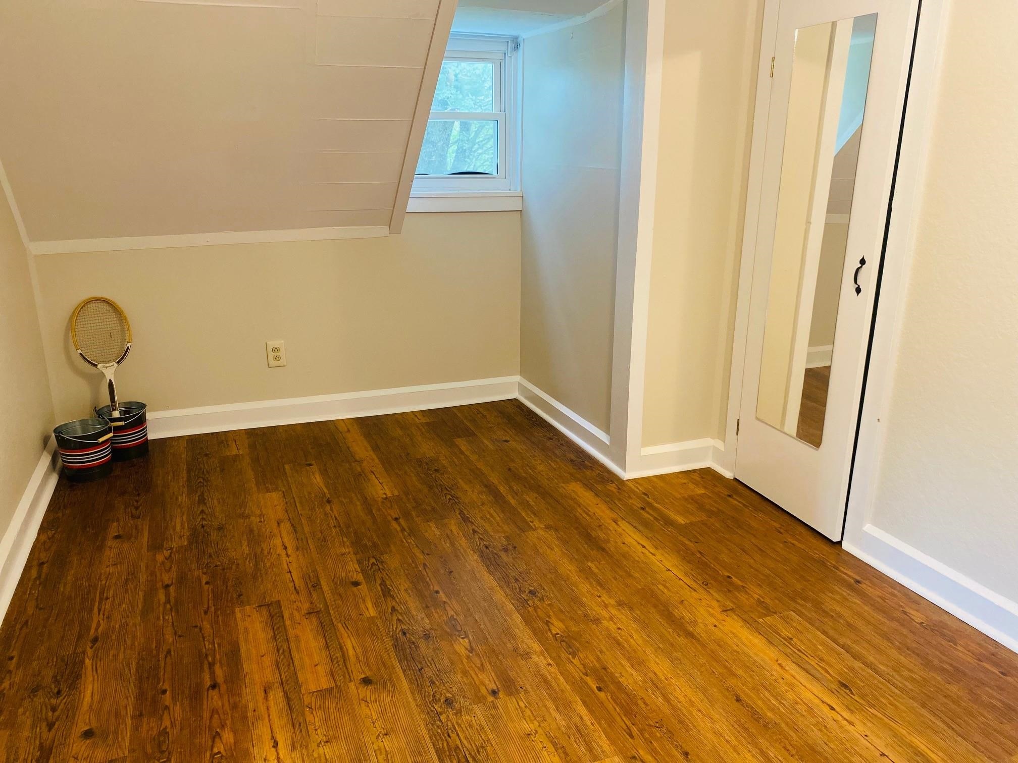 7524 Briery Branch Road Dayton, VA 22821 - Photo 20 of 28 a view of a room with wooden floor and a sink