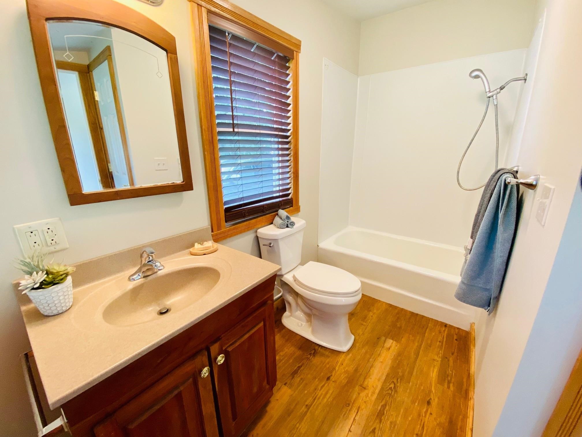 7524 Briery Branch Road Dayton, VA 22821 - Photo 21 of 28 a bathroom with a sink and a mirror