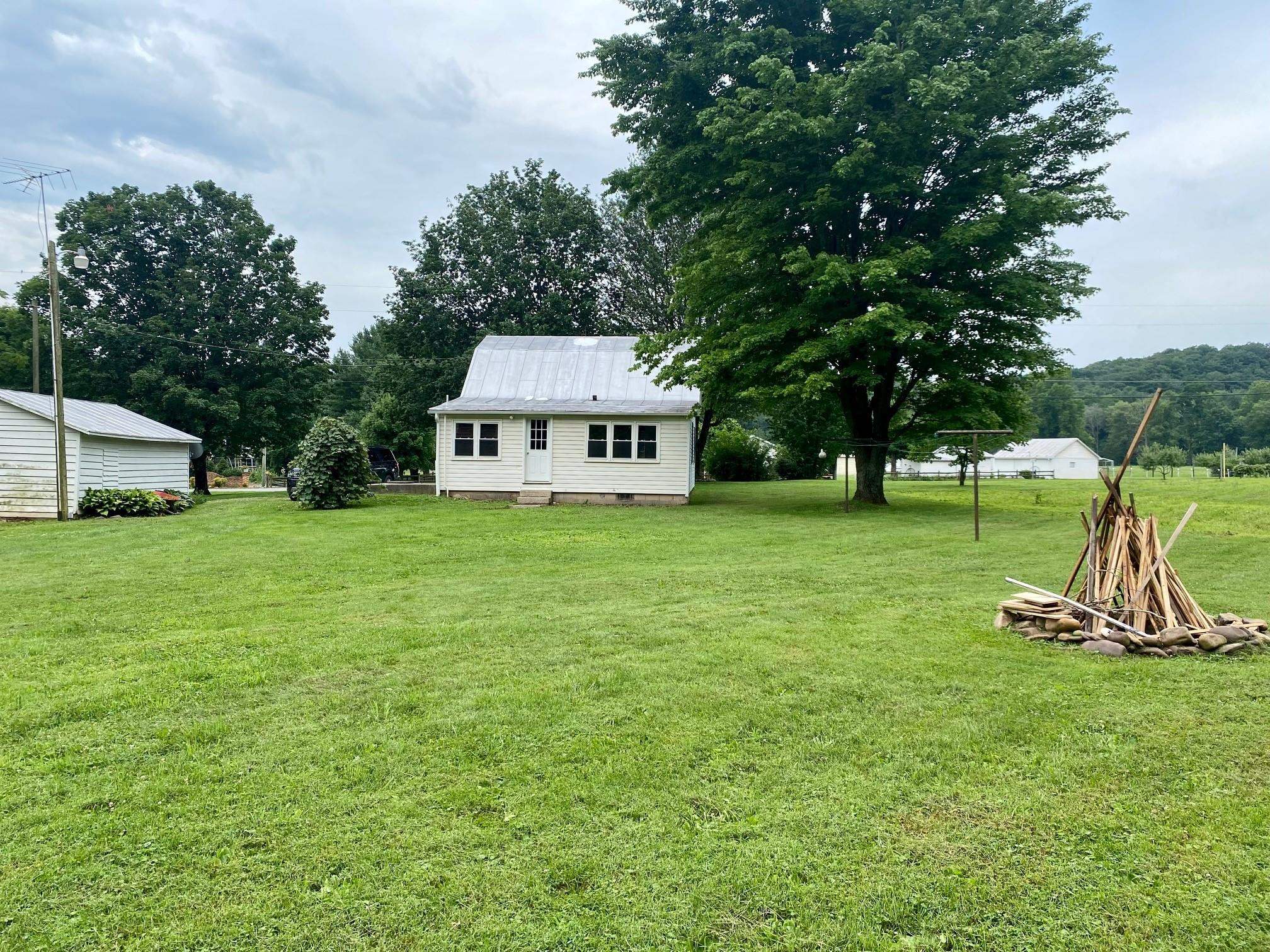 7524 Briery Branch Road Dayton, VA 22821 - Photo 24 of 28 a house view with a sitting space and garden
