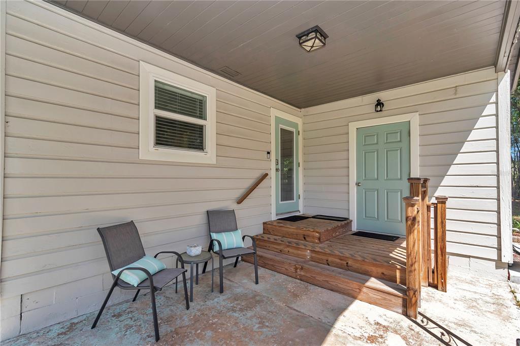 4180 West Anthony Road Ocala, FL 34475 - Photo 26 of 38 Side porch with entrance to laundry