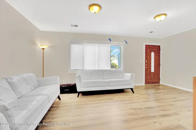 a living room with furniture and a couch