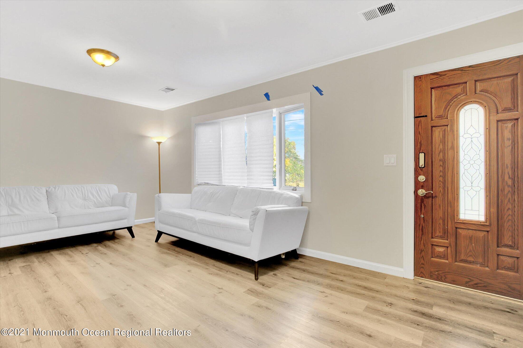 972 Woodgate Avenue Long Branch, NJ 07740 - Photo 4 of 20 a living room with furniture and a window
