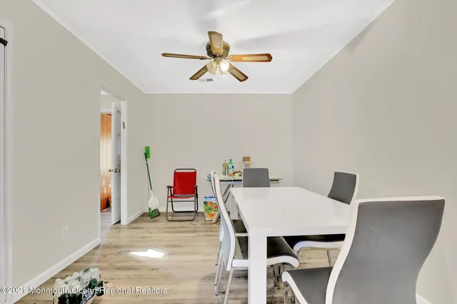 a view of a dining room with furniture
