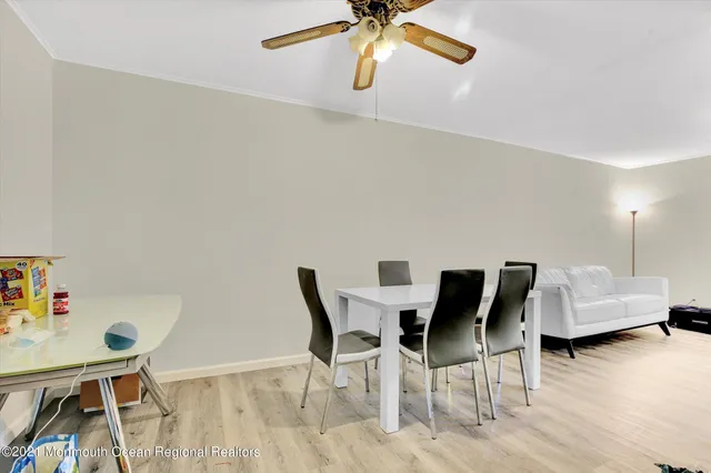 a view of livingroom and hardwood floor