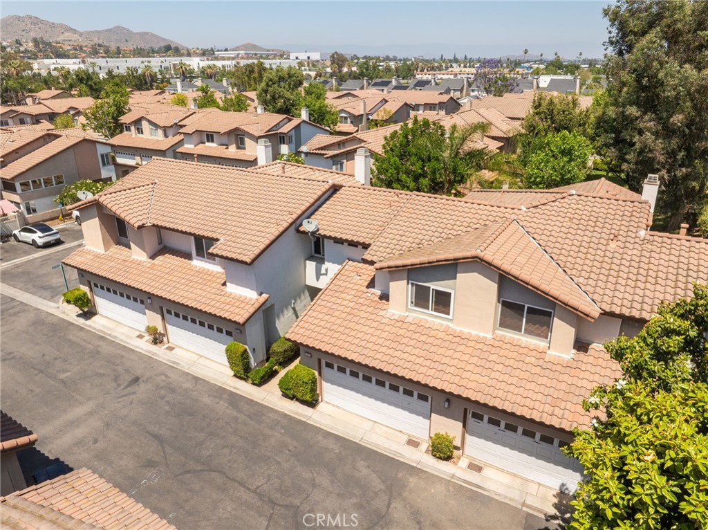 3707 Calle Curacso Riverside, CA 92503 - Photo 31 of 43 an aerial view of a house with a yard and seating space