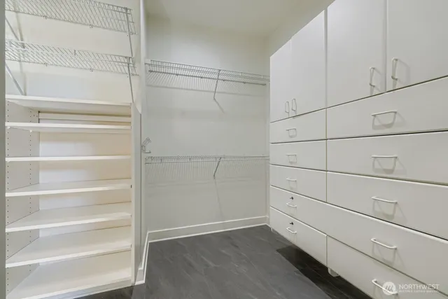 a view of an empty walk in closet