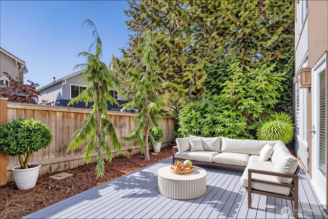a view of a patio with a dining table and chair