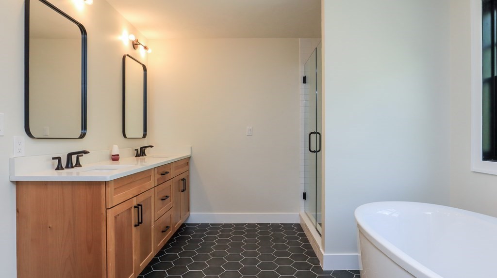 340 Longley Road Groton, MA 01450 - Photo 11 of 20 a bathroom with a double vanity sink mirror and toilet