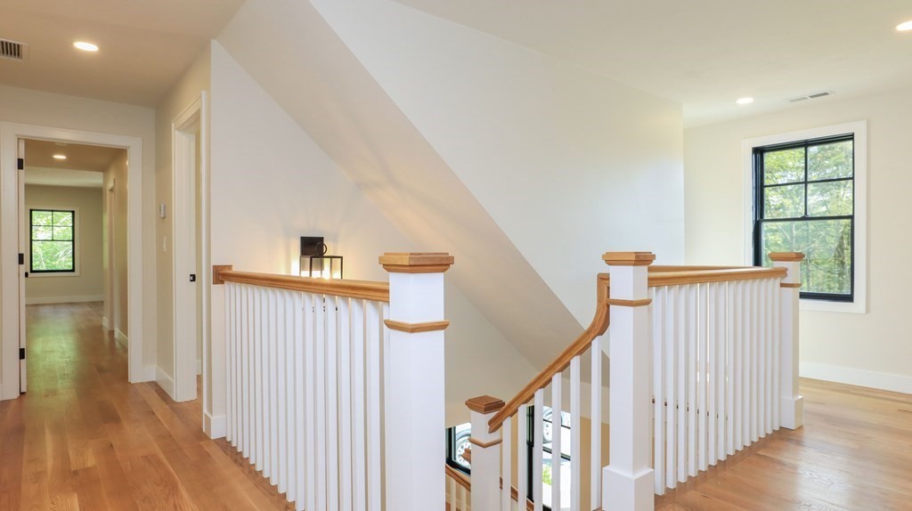 340 Longley Road Groton, MA 01450 - Photo 13 of 20 a view of a hallway with wooden floor and entryway