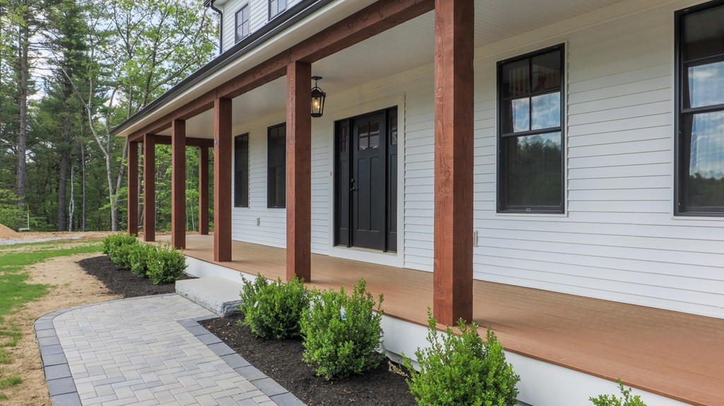 340 Longley Road Groton, MA 01450 - Photo 17 of 20 a front view of a house with a yard