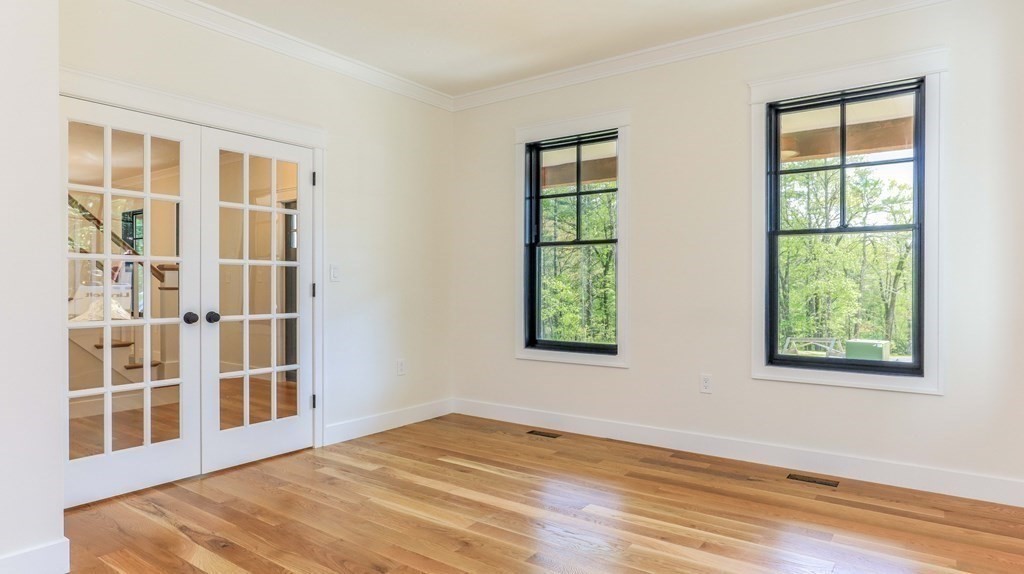 340 Longley Road Groton, MA 01450 - Photo 4 of 20 a view of an empty room with a window