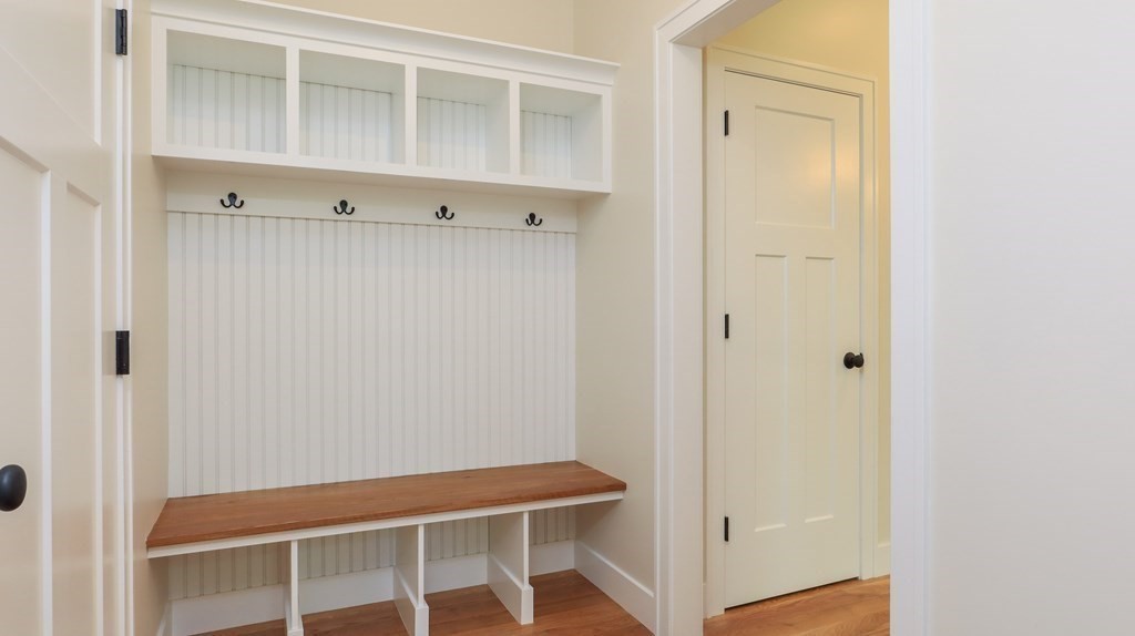 340 Longley Road Groton, MA 01450 - Photo 5 of 20 a room with a bench