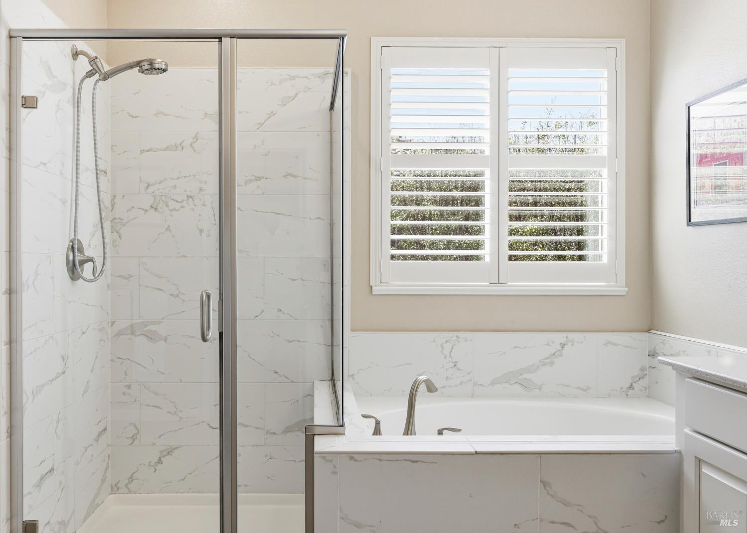 5533 Kennedy Place Rohnert Park, CA 94928 - Photo 27 of 63 a white bath tub sitting next to a window