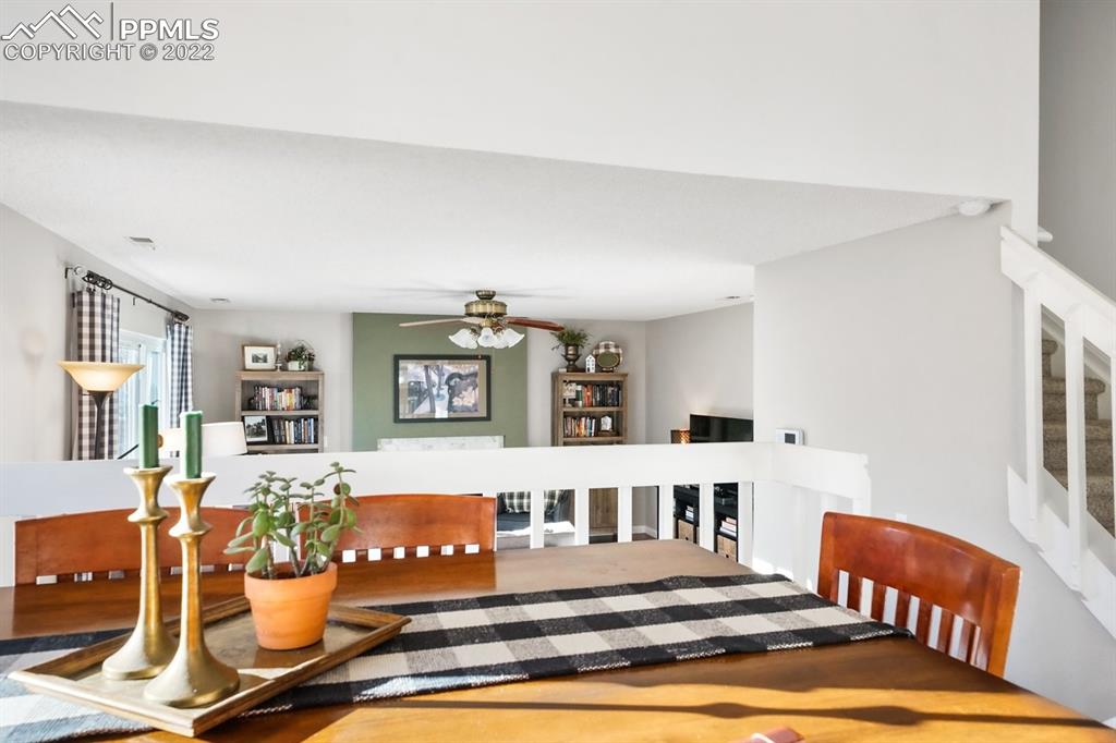 5145 Slickrock Drive Colorado Springs, CO 80923 - Photo 12 of 33 a view of a living room and dining room