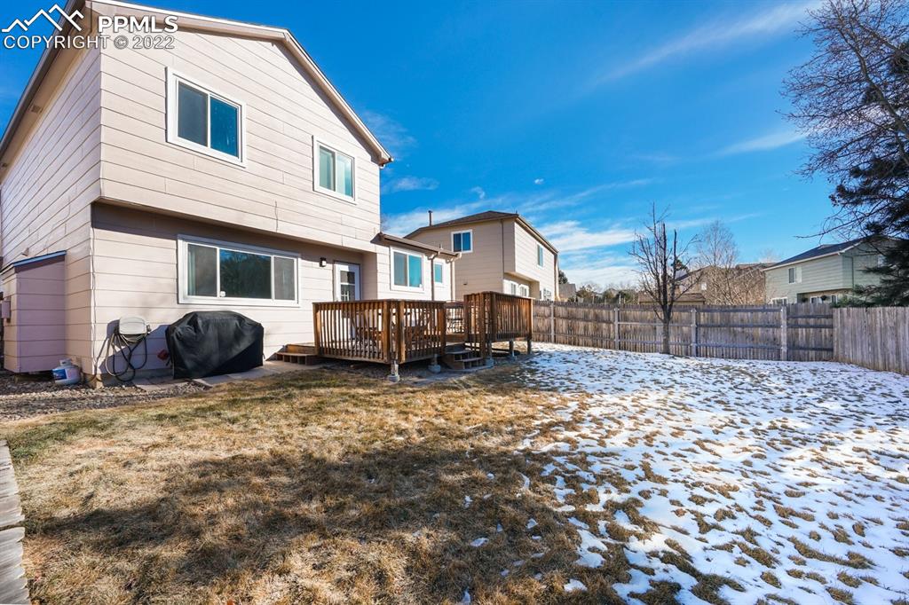 5145 Slickrock Drive Colorado Springs, CO 80923 - Photo 27 of 33 a view of a house with a patio