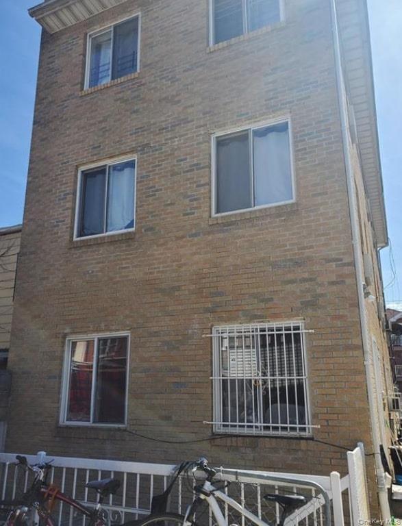 103-55 52nd Avenue Queens, NY 11368 - Photo 2 of 13 a brick building that has a lot of windows