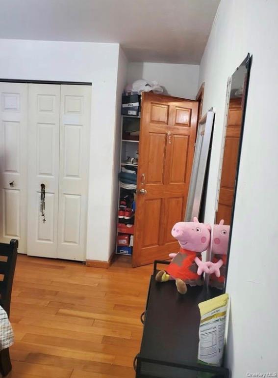 103-55 52nd Avenue Queens, NY 11368 - Photo 7 of 13 a room with toys and wooden floor