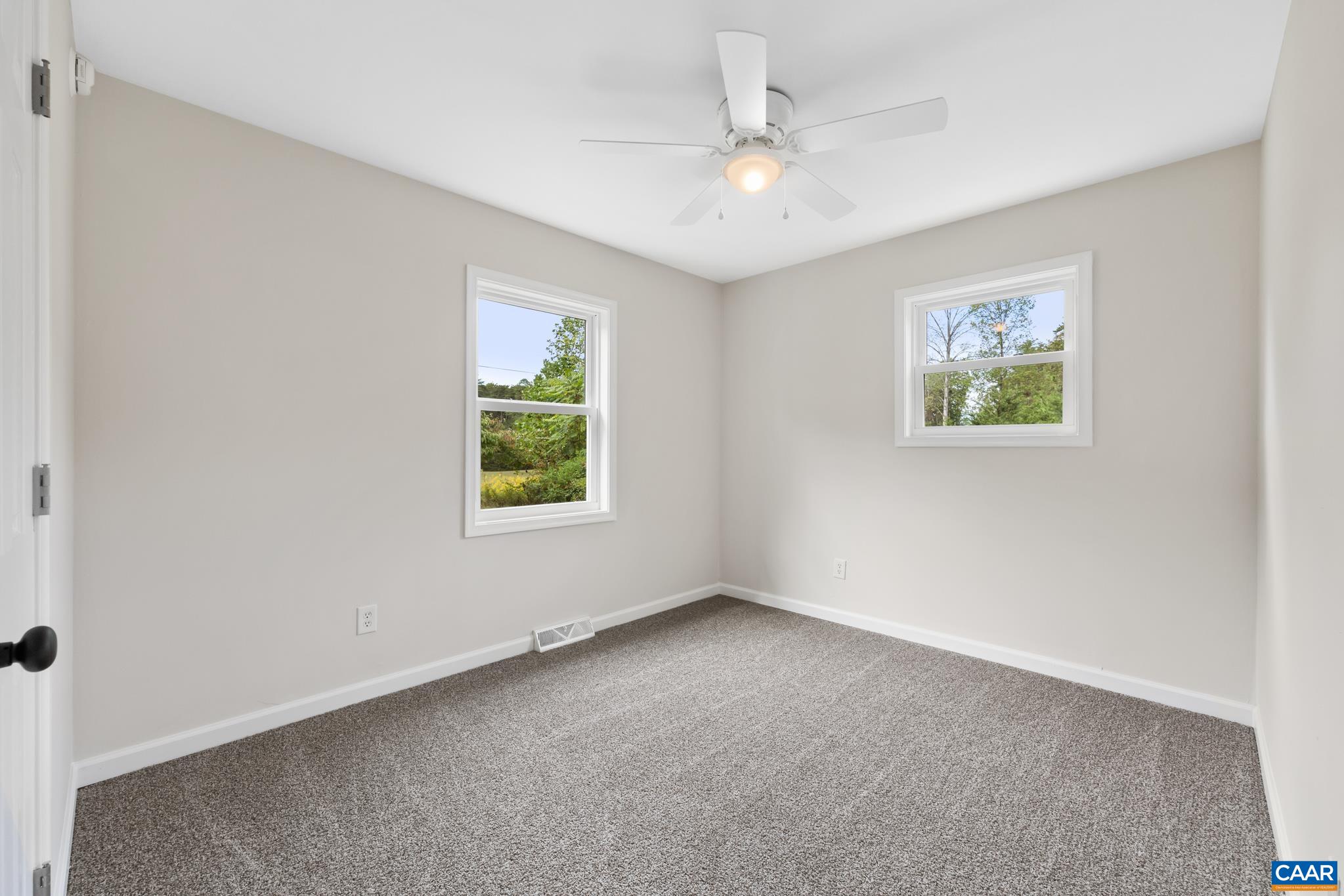 19 Harlow Town Road Louisa, VA 23093 - Photo 18 of 26 an empty room with windows