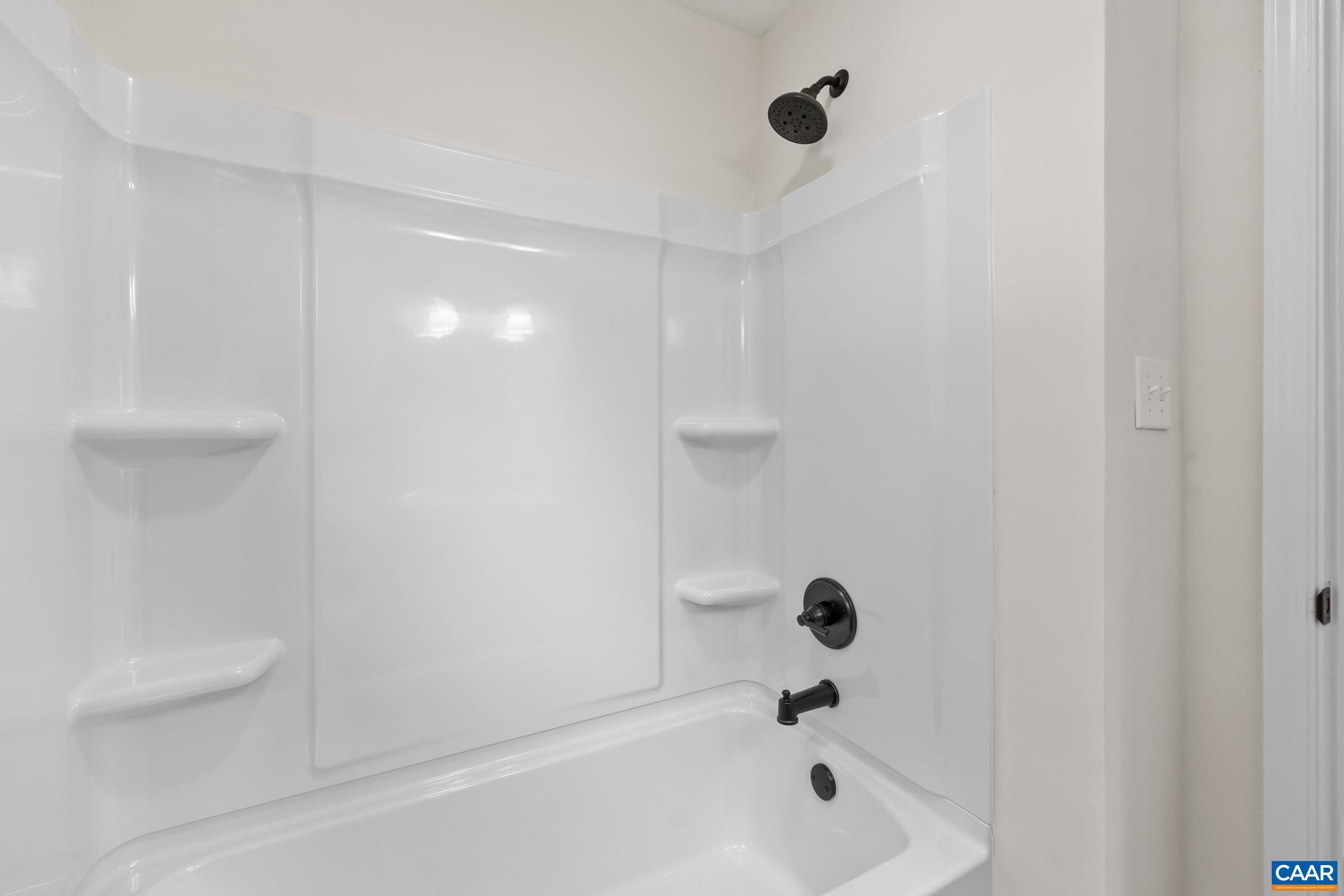 19 Harlow Town Road Louisa, VA 23093 - Photo 21 of 26 a bathroom with a bathtub