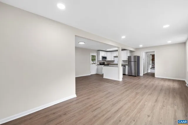 a view of kitchen with wooden floor