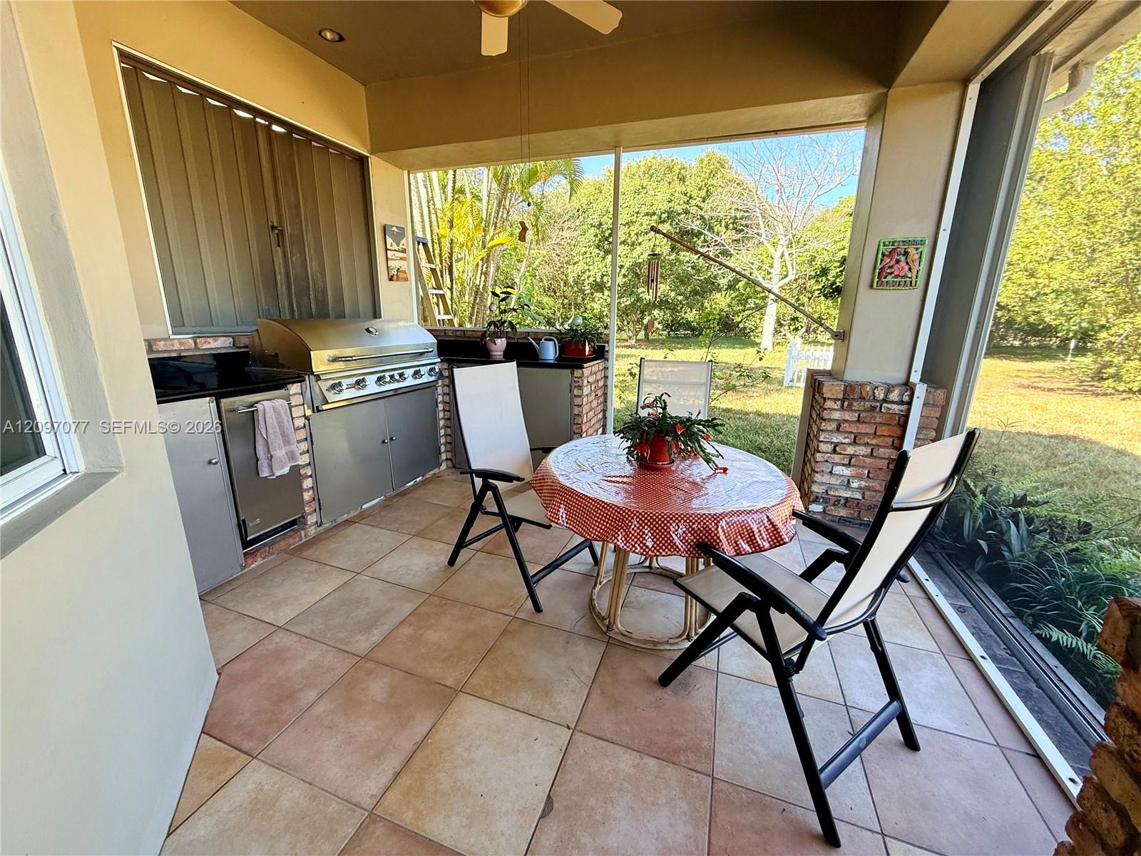 20175 Southwest 256th Street Homestead, FL 33031 - Photo 33 of 41 Patio with outdoor kitchen