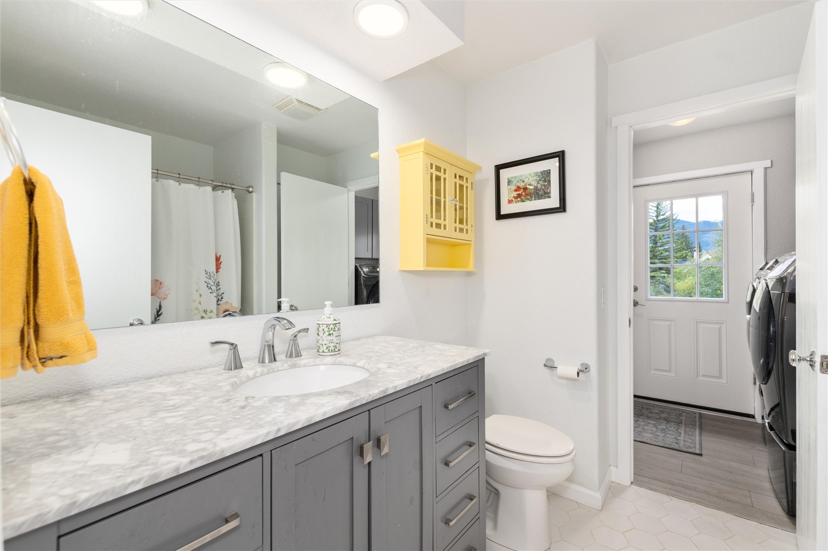11 Blue Ridge Street Heeney, CO 80498 - Photo 23 of 45 The renovated bathroom features a quartz-top vanity and farmhouse style.