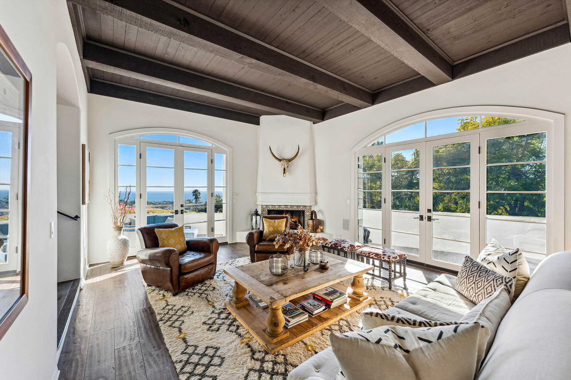 396 Las Alturas Road Santa Barbara, CA 93103 - Photo 1 of 70 a living room with furniture floor to ceiling window and wooden floor