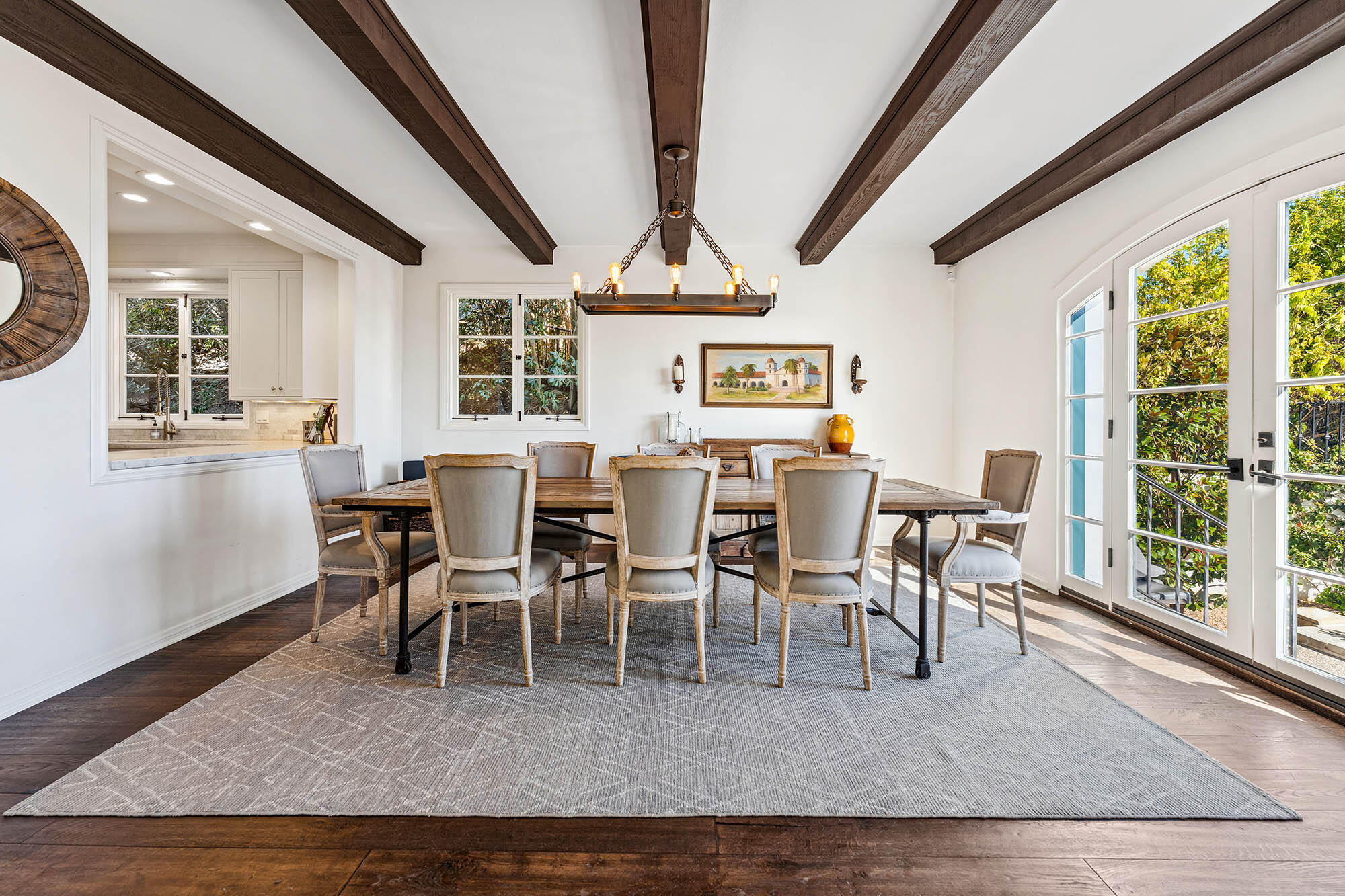 396 Las Alturas Road Santa Barbara, CA 93103 - Photo 20 of 70 a view of a dining room with furniture window and wooden floor