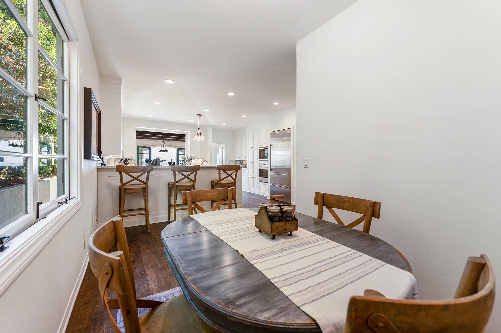 396 Las Alturas Road Santa Barbara, CA 93103 - Photo 26 of 70 a view of a dining room with furniture
