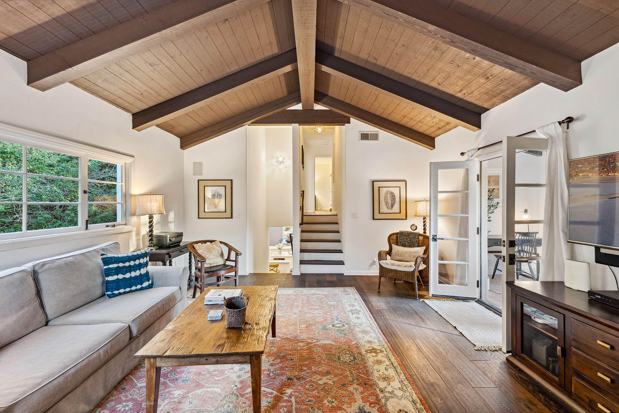 396 Las Alturas Road Santa Barbara, CA 93103 - Photo 29 of 70 a living room with furniture fireplace and a large window