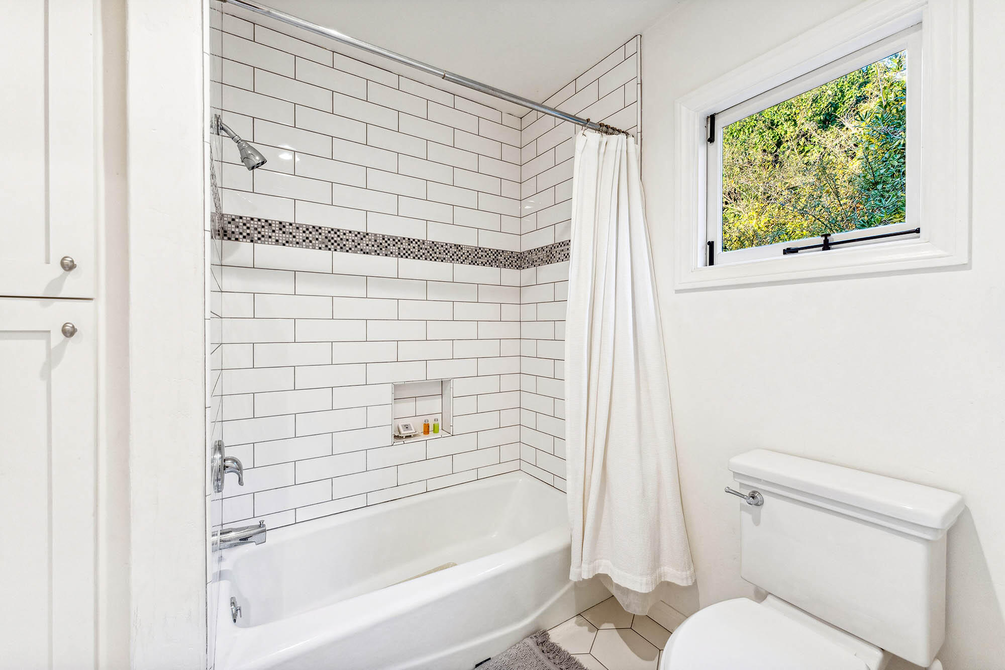 396 Las Alturas Road Santa Barbara, CA 93103 - Photo 35 of 70 a bathroom with a bathtub and a shower