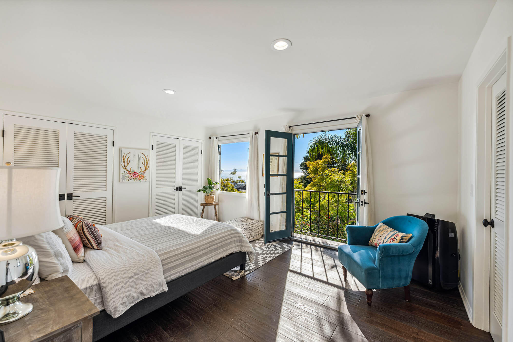 396 Las Alturas Road Santa Barbara, CA 93103 - Photo 37 of 70 a bedroom with a bed and a window