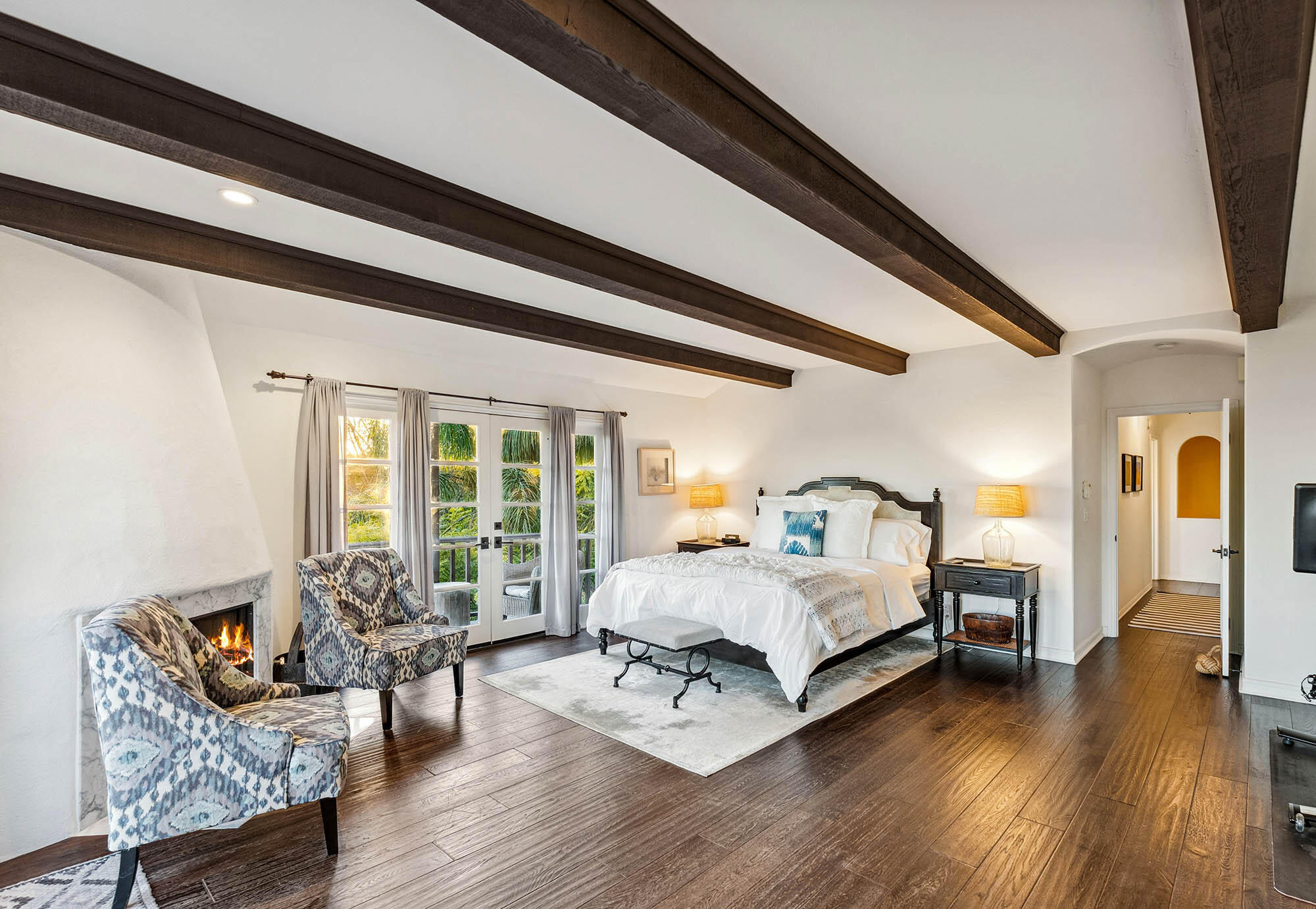 396 Las Alturas Road Santa Barbara, CA 93103 - Photo 39 of 70 a spacious bedroom with a bed and wooden floor