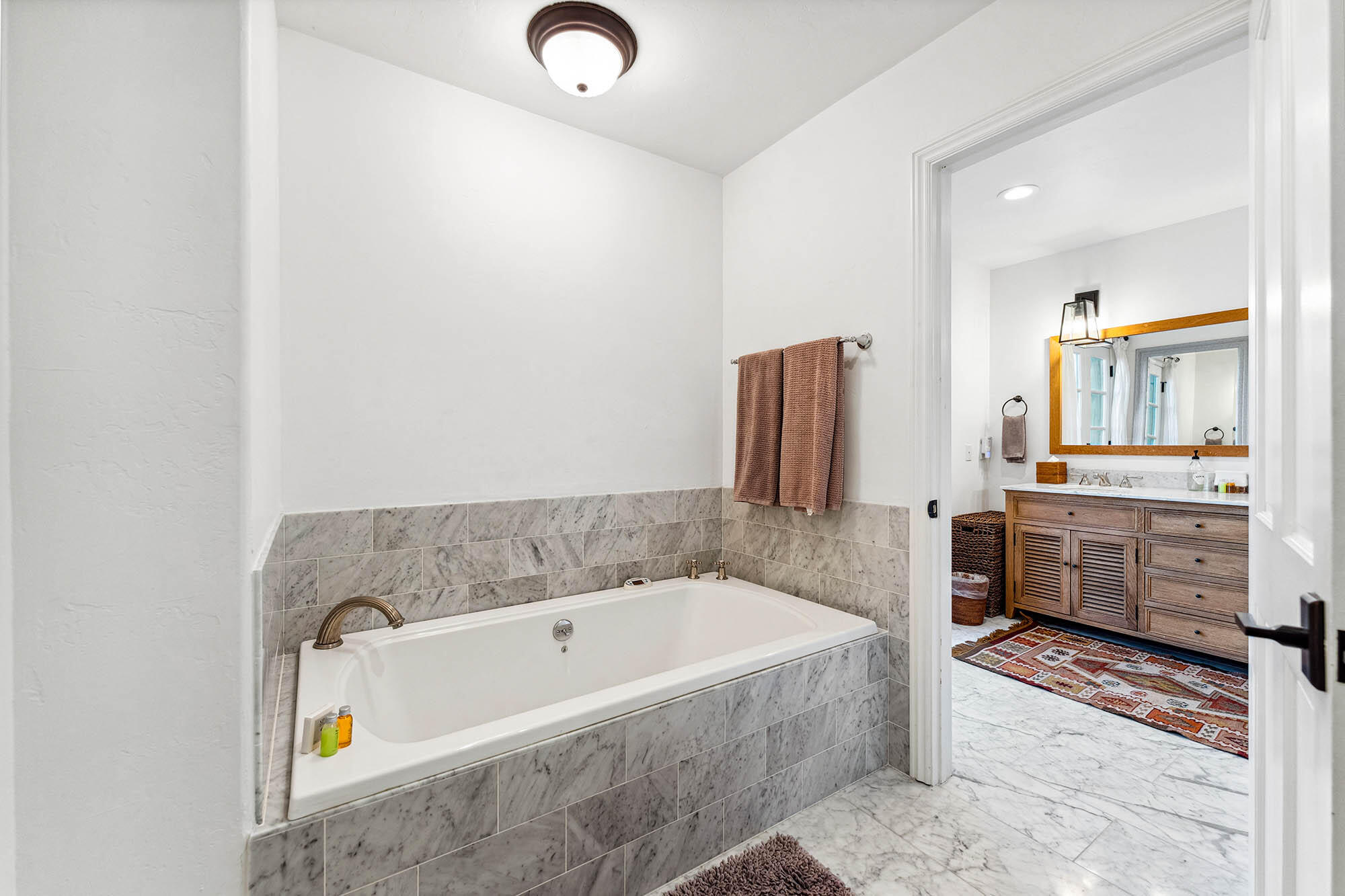 396 Las Alturas Road Santa Barbara, CA 93103 - Photo 41 of 70 a bathroom with a bathtub and a sink