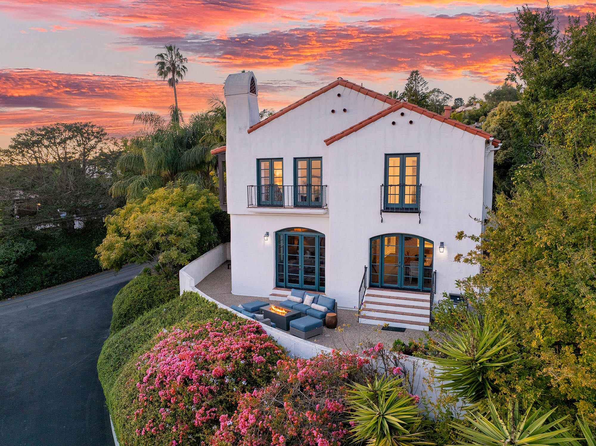 396 Las Alturas Road Santa Barbara, CA 93103 - Photo 55 of 70 a front view of a house with a yard