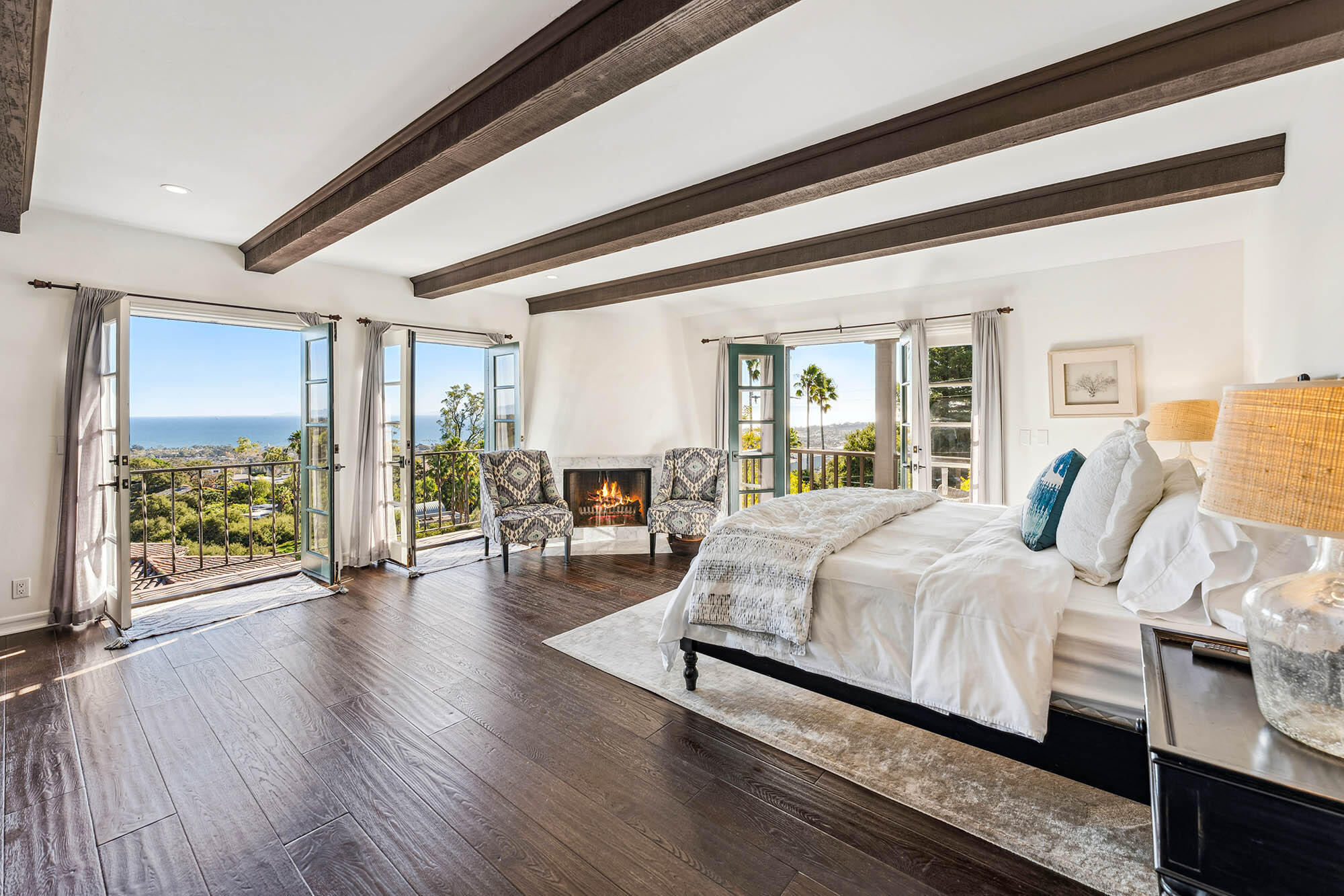 396 Las Alturas Road Santa Barbara, CA 93103 - Photo 7 of 70 a bedroom with a large bed and a large window