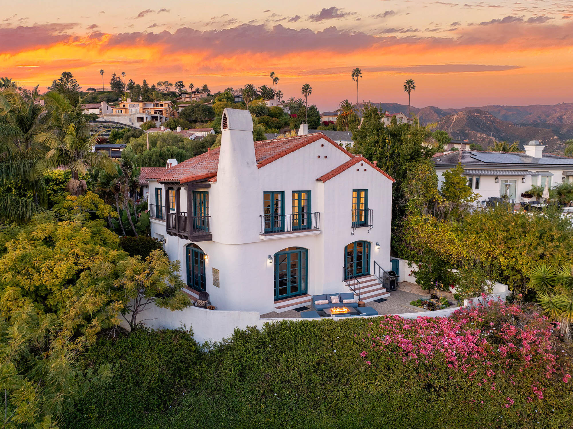 396 Las Alturas Road Santa Barbara, CA 93103 - Photo 10 of 70 a front view of a house with a yard