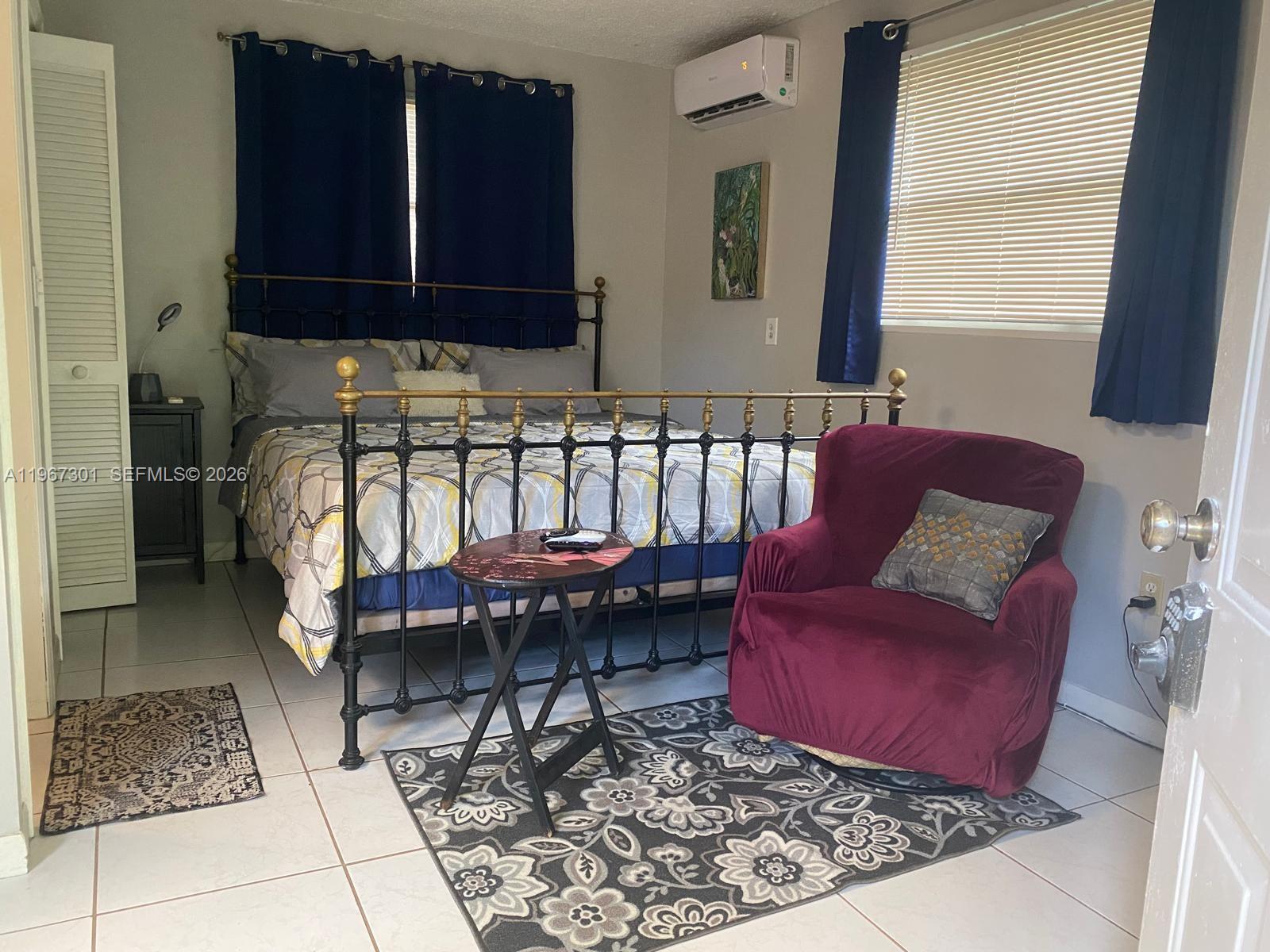 1760 Northeast 144th Street Miami, FL 33181 - Photo 31 of 83 a living room with furniture and a rug