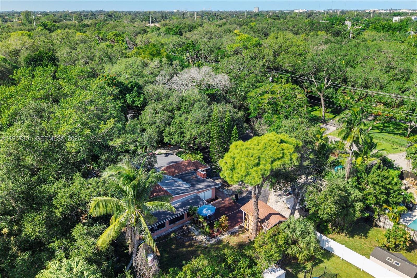 1760 Northeast 144th Street Miami, FL 33181 - Photo 4 of 83 a view of a garden with plants