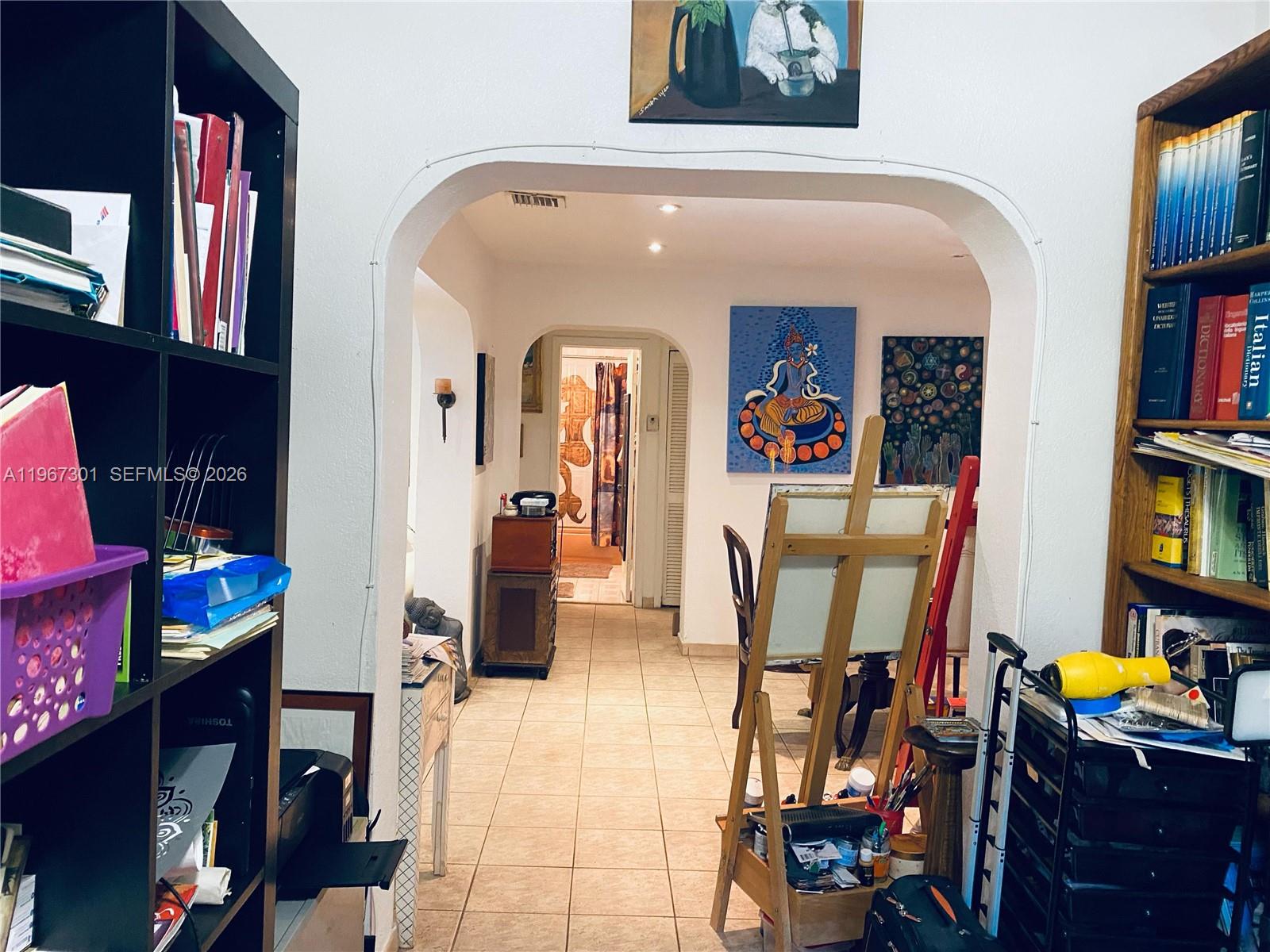 1760 Northeast 144th Street Miami, FL 33181 - Photo 51 of 83 a view of a entryway with furniture and toys