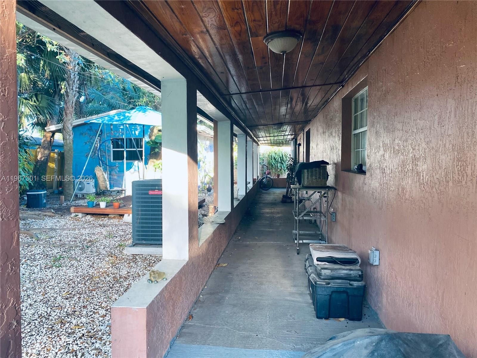 1760 Northeast 144th Street Miami, FL 33181 - Photo 74 of 83 a view of a porch with furniture