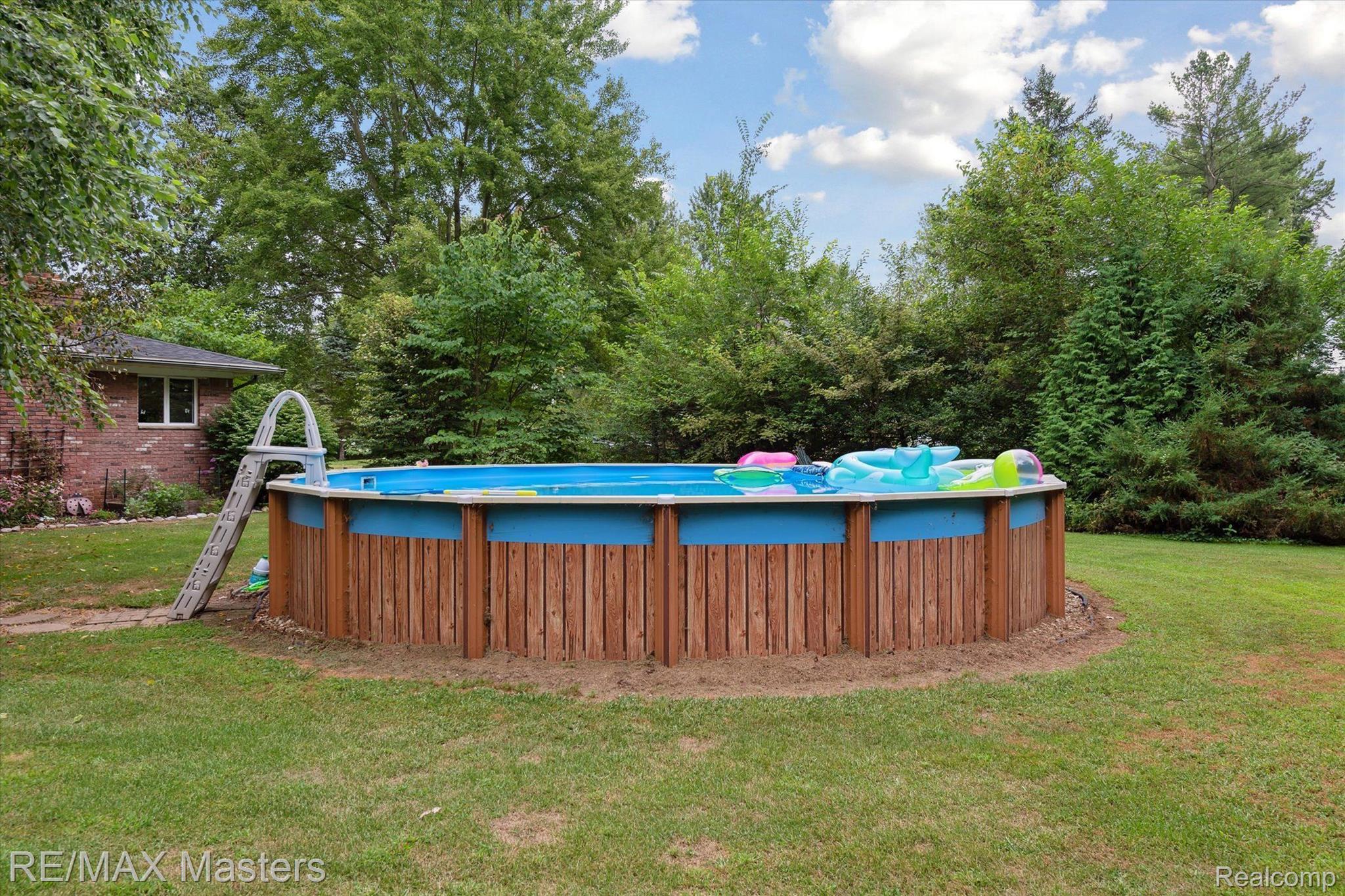 21610 Otter Road Belleville, MI 48111 - Photo 28 of 35 Cool Off In The Pool