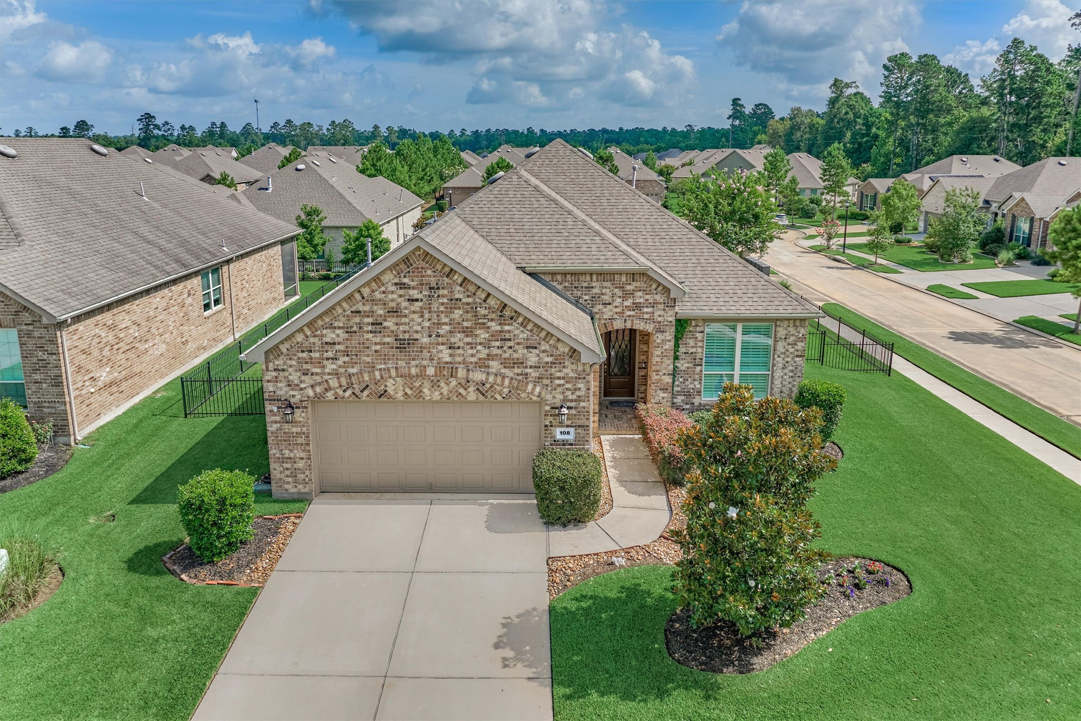 108 Wild Wick Way Spring, TX 77382 - Photo 1 of 44 Enjoy The Beautiful Curb Appeal Of This All- Brick, One-Story Home In Gated, Age 55+ Del Webb!