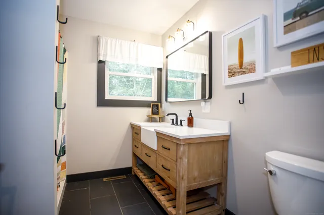 a bathroom with a sink and a toilet