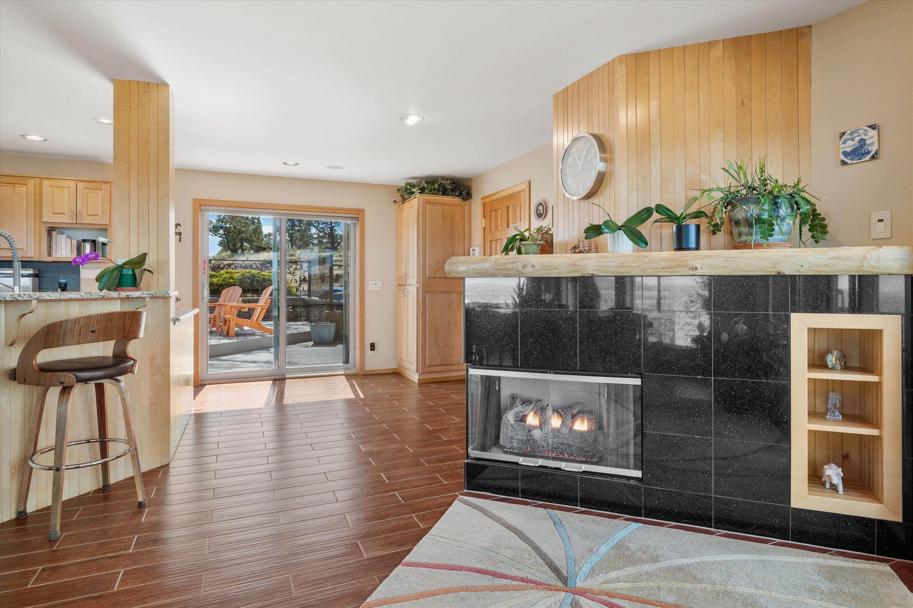 3124 Northwest Lynch Way Redmond, OR 97756 - Photo 11 of 89 Fireplace two is in kitchen/dining