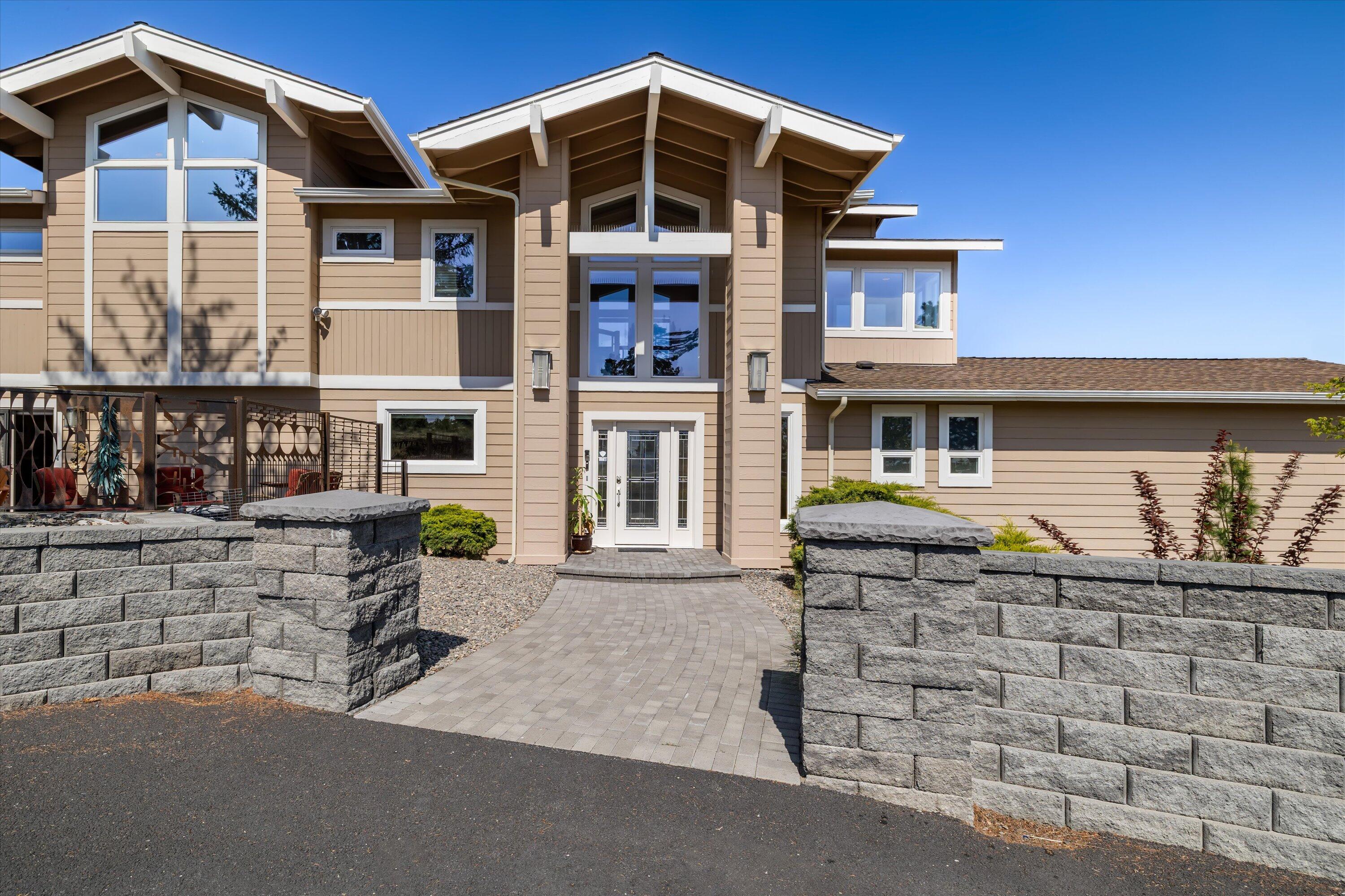 3124 Northwest Lynch Way Redmond, OR 97756 - Photo 2 of 89 A grand covered entrance