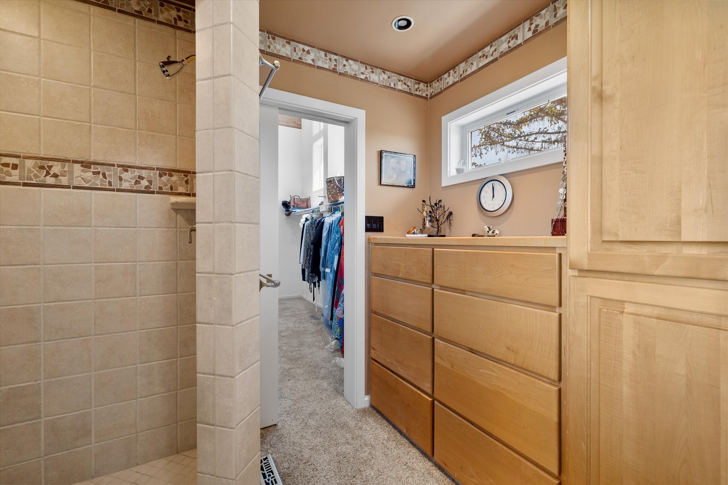 3124 Northwest Lynch Way Redmond, OR 97756 - Photo 53 of 89 Shower with dual heads and built in wardrobes