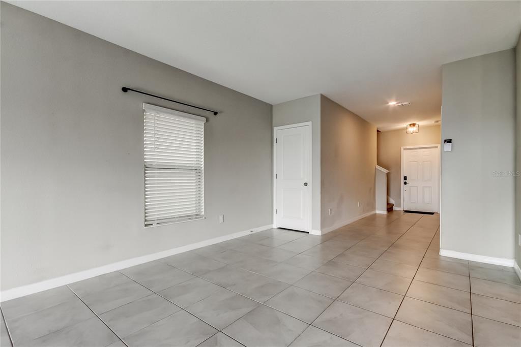 31592 Barrel Wave Way Wesley Chapel, FL 33545 - Photo 20 of 62 a view of an empty room with a window