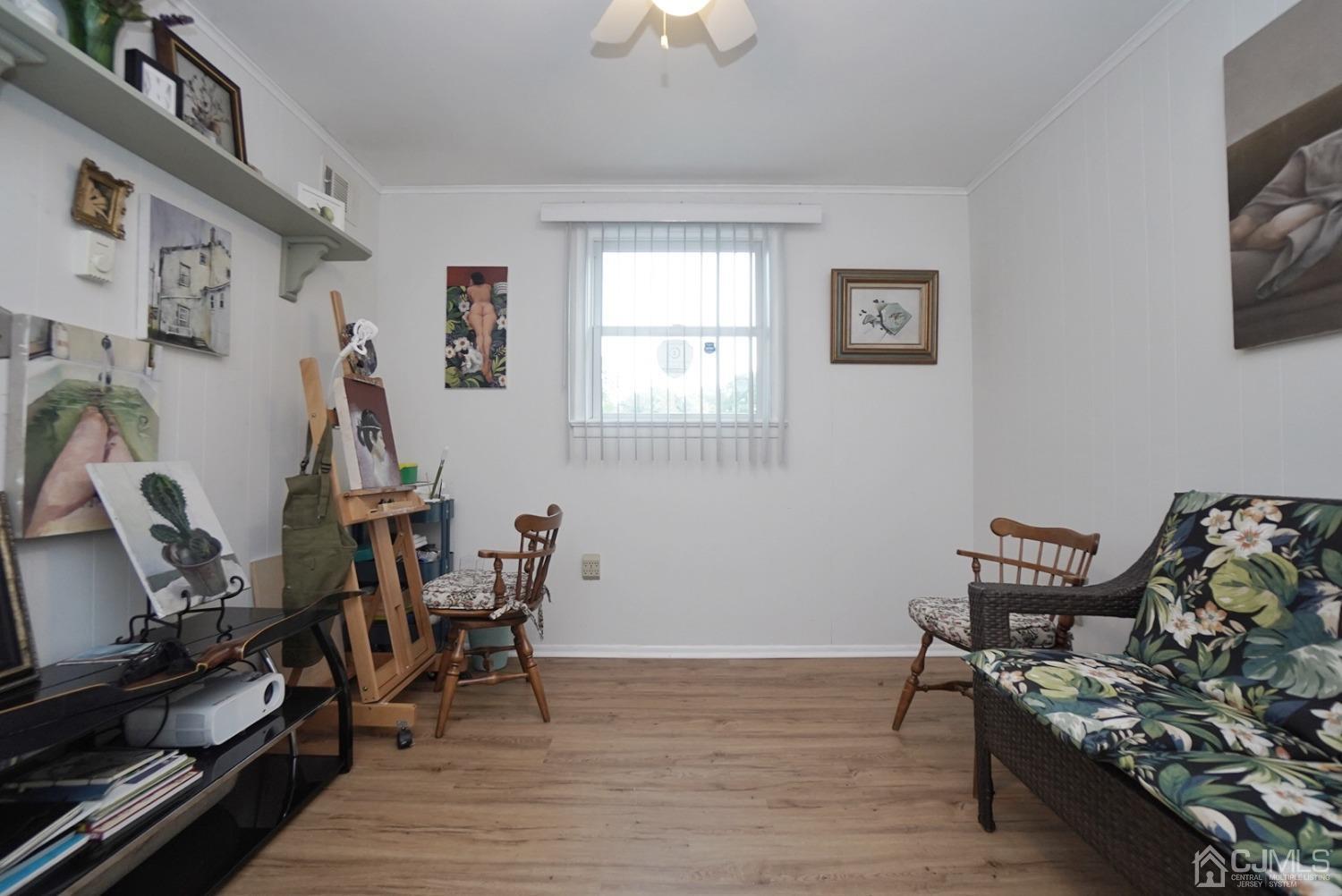 60 Annette Drive Edison, NJ 08820 - Photo 14 of 69 a room with furniture and a flat screen tv